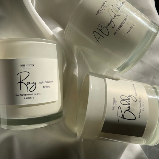 Get all three scented candles in the 'home for the holidays' candle collection. Buddy Candle: Notes of Vanilla, Sugar and Oats |10 oz candle A Bourgeois Christmas Candle: Notes of Pine, Eucalyptus, and Fir |10 oz candle Ray Candle: Notes of Apple, Cinnamon and Nutmeg |10 oz candle Coconut Soy Wax Crackling wooden wick